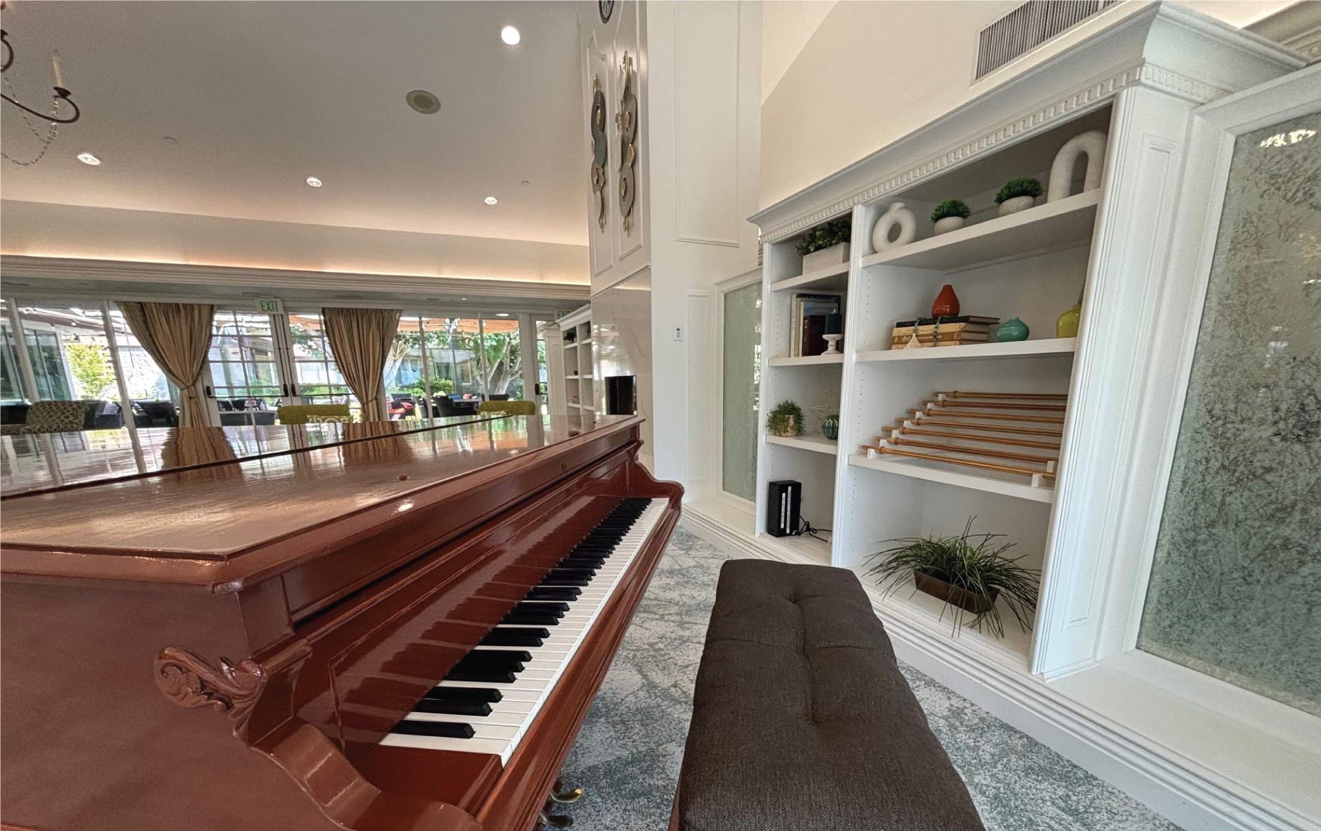 modern piano at the living room of assisted living in glendale, ca